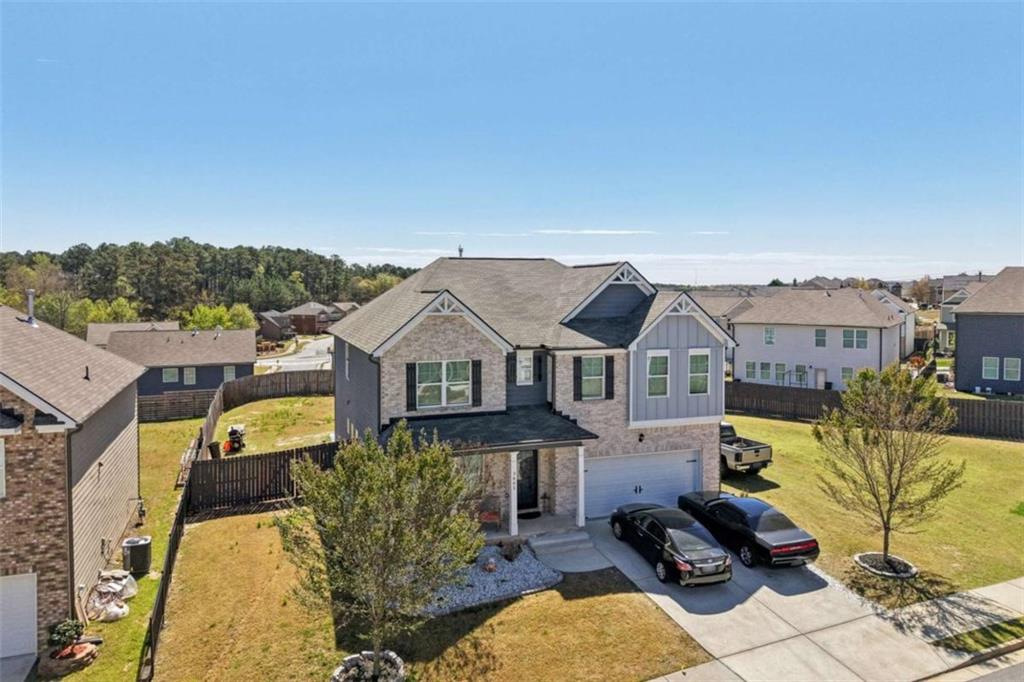 3605 Broadwick Lane Lithonia, GA 30038 - Photo 26 of 41 a view of a house with a big yard plants and large tree