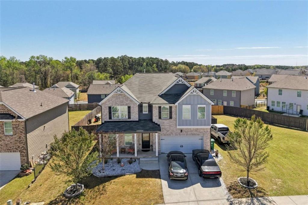 3605 Broadwick Lane Lithonia, GA 30038 - Photo 27 of 41 an aerial view of a house with a swimming pool