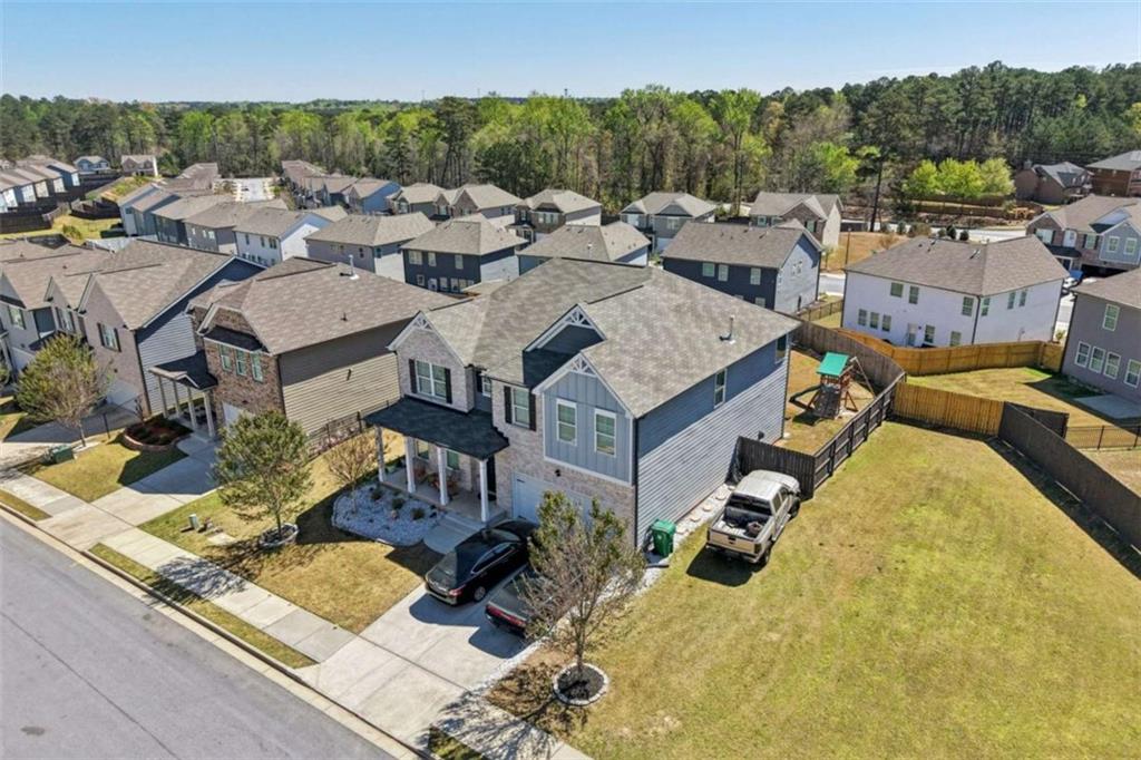3605 Broadwick Lane Lithonia, GA 30038 - Photo 28 of 41 a view of a house with pool and chairs