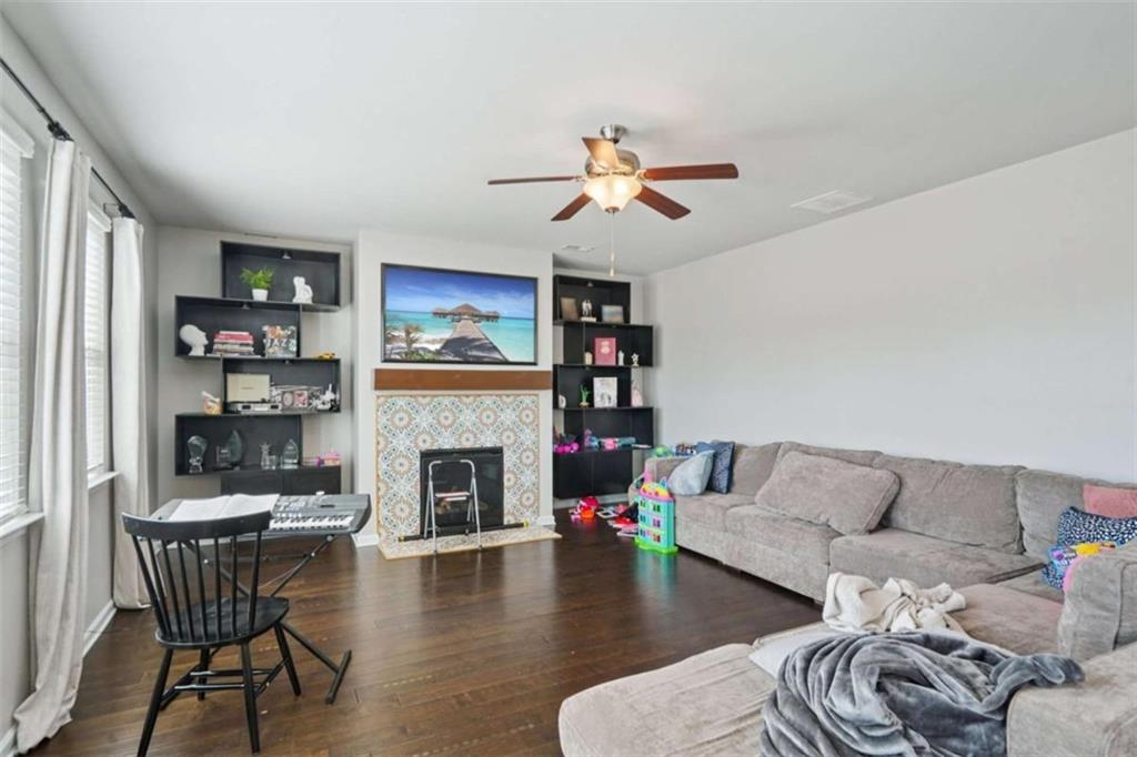 3605 Broadwick Lane Lithonia, GA 30038 - Photo 3 of 41 a living room with furniture and a fireplace