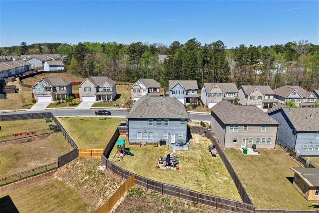 3605 Broadwick Lane Lithonia, GA 30038 - Photo 38 of 41 a view of a house with pool and chairs