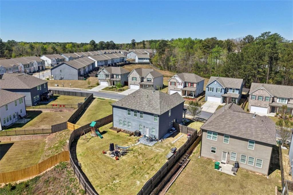 3605 Broadwick Lane Lithonia, GA 30038 - Photo 39 of 41 an aerial view of a house with swimming pool and mountains