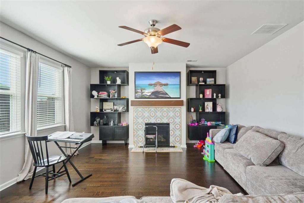 3605 Broadwick Lane Lithonia, GA 30038 - Photo 4 of 41 a living room with furniture and a fireplace