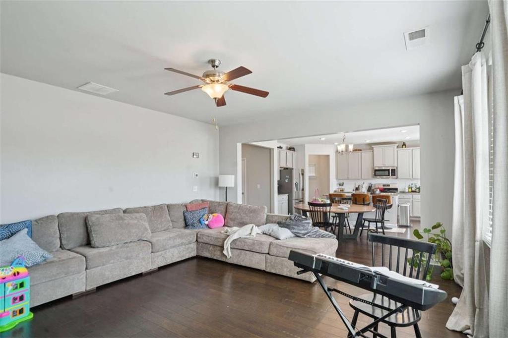 3605 Broadwick Lane Lithonia, GA 30038 - Photo 5 of 41 a living room with furniture and a large window