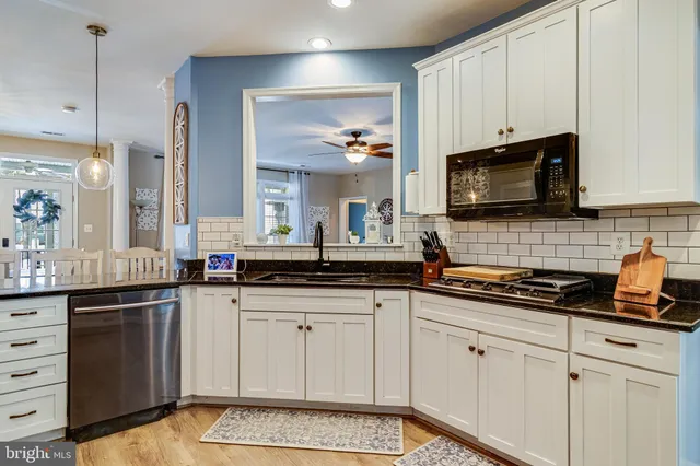 a view of workspace with furniture and windows