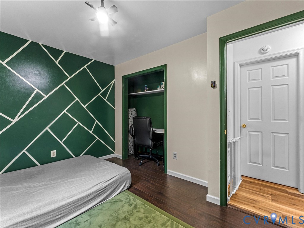 14175 Lebanon Road Disputanta, VA 23842 - Photo 37 of 60 Room featuring a geometric accent wall in deep gre