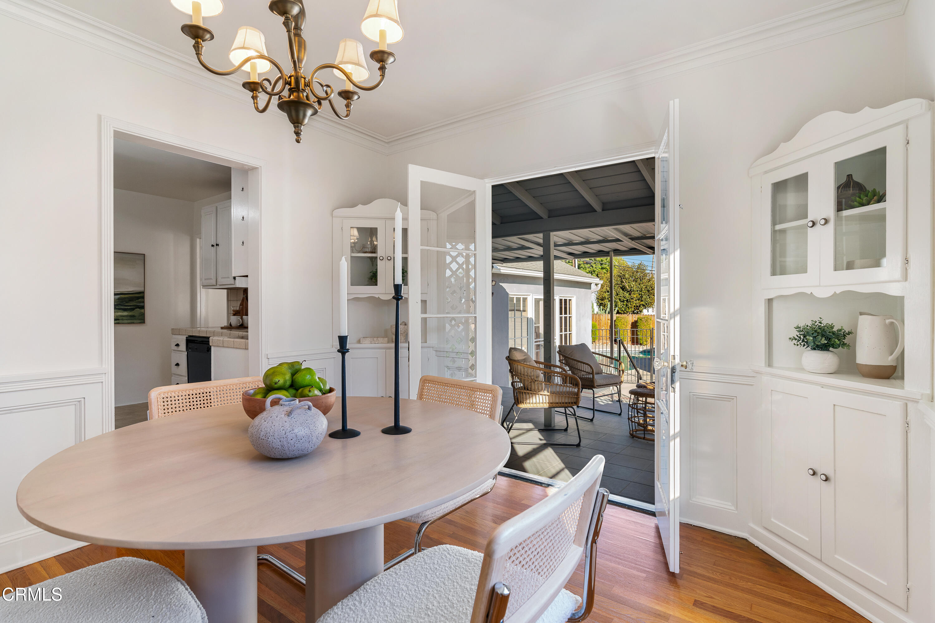 990 Bella Vista Avenue Pasadena, CA 91107 - Photo 4 of 16 a view of a dining room with furniture and wooden floor