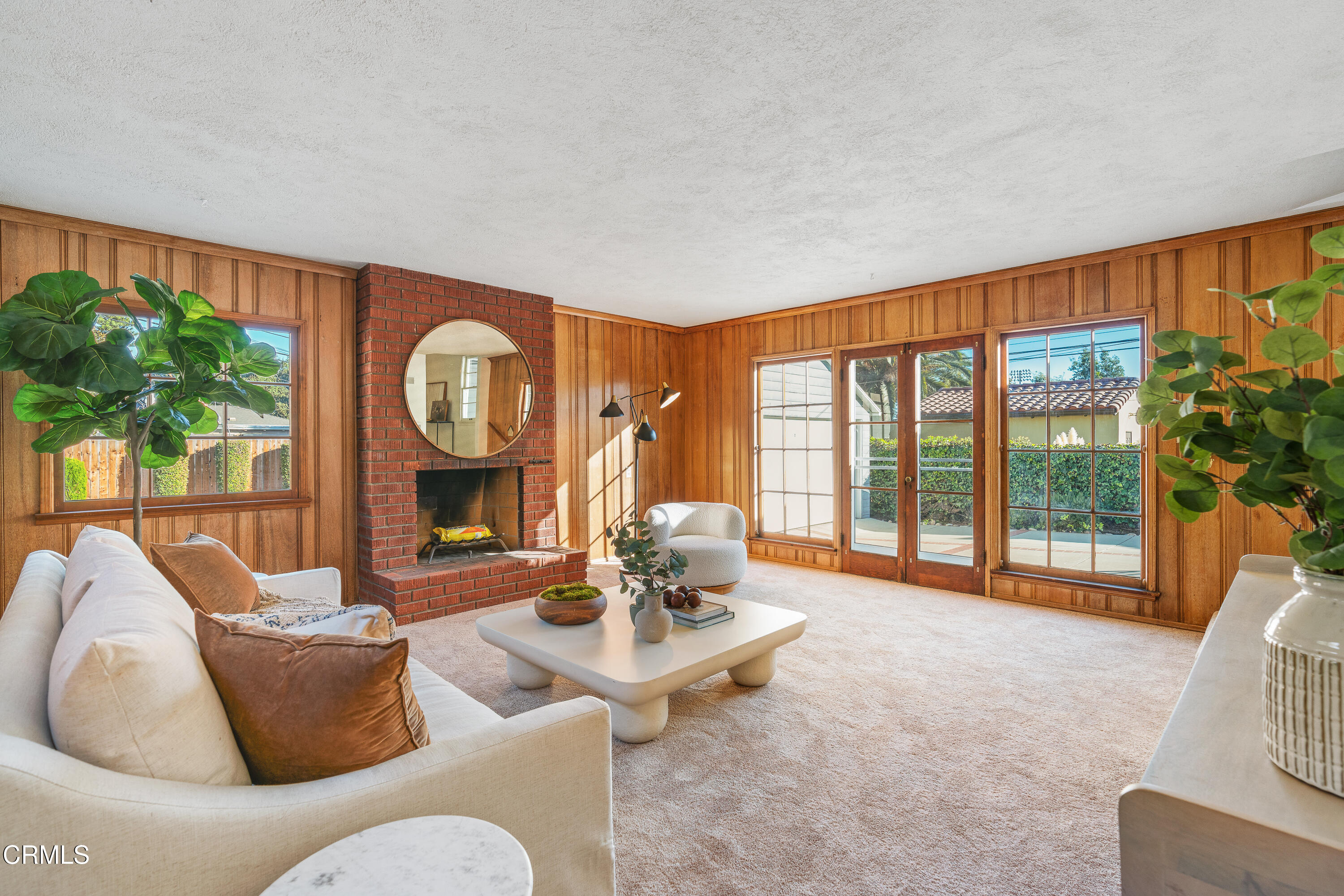 990 Bella Vista Avenue Pasadena, CA 91107 - Photo 6 of 16 a living room with furniture and a large window