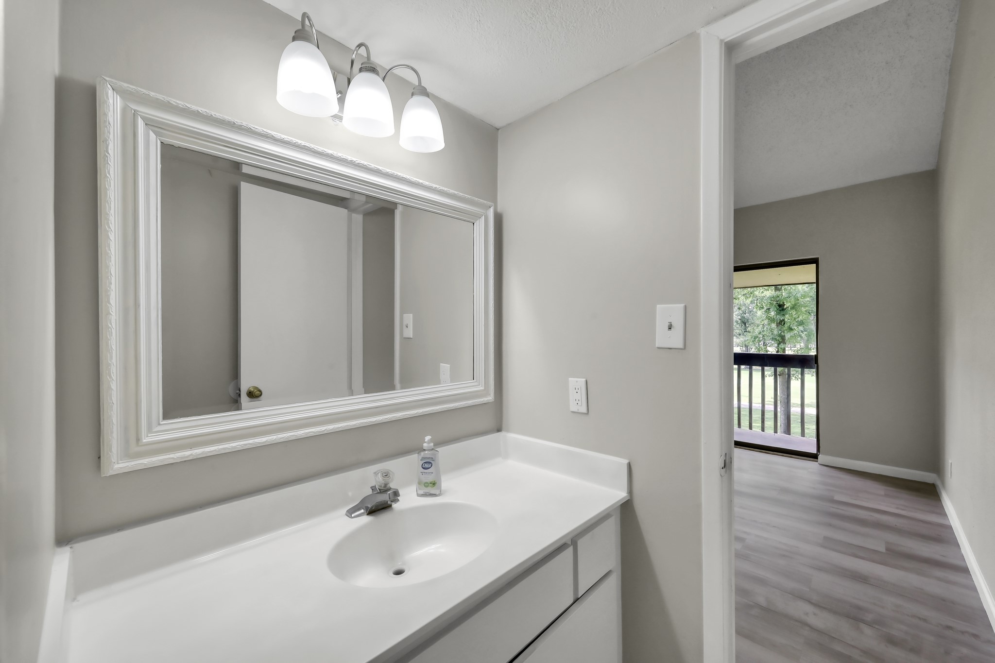 12900 Walden Road, Unit 604F Montgomery, TX 77356 - Photo 12 of 19 a bathroom with a sink and a mirror