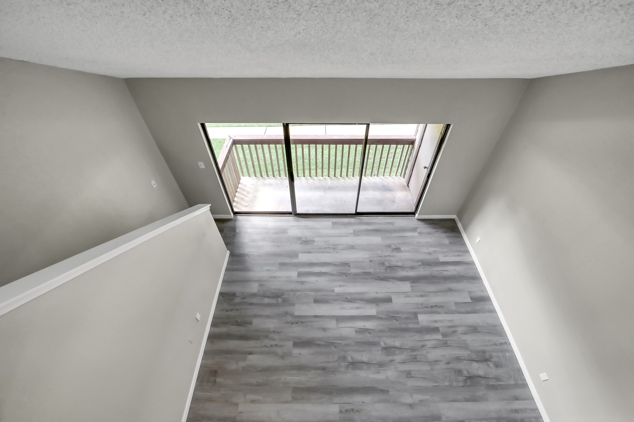 12900 Walden Road, Unit 604F Montgomery, TX 77356 - Photo 17 of 19 a view of entryway with wooden floor