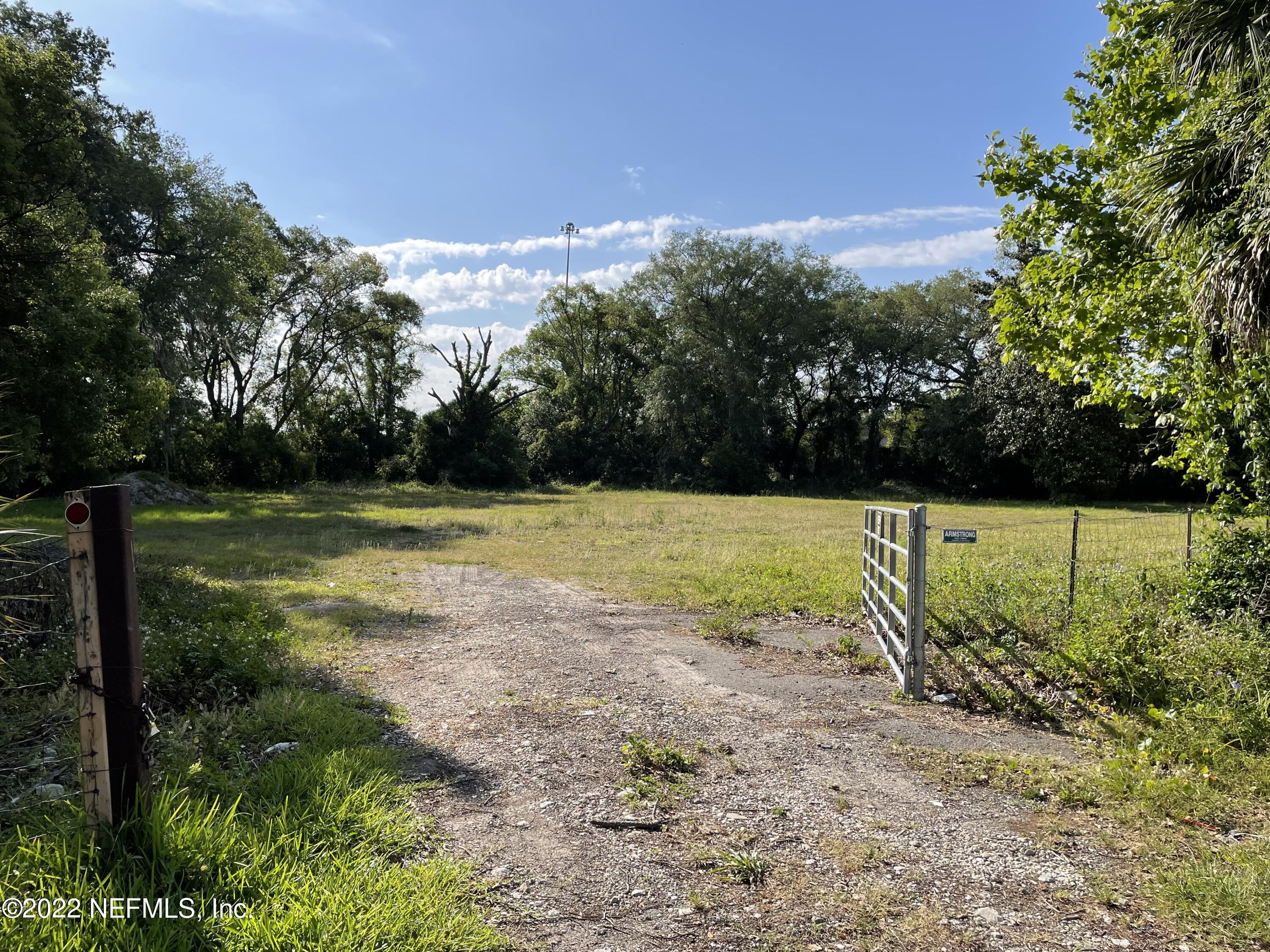 5517 Firestone Road Jacksonville, FL 32244 - Photo 1 of 4 a view of a park with large trees