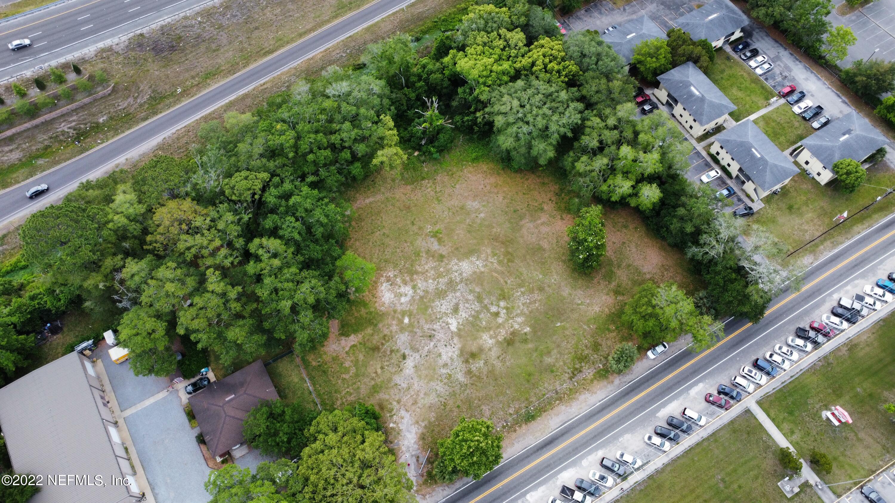 5517 Firestone Road Jacksonville, FL 32244 - Photo 3 of 4 a view of a garden from a balcony