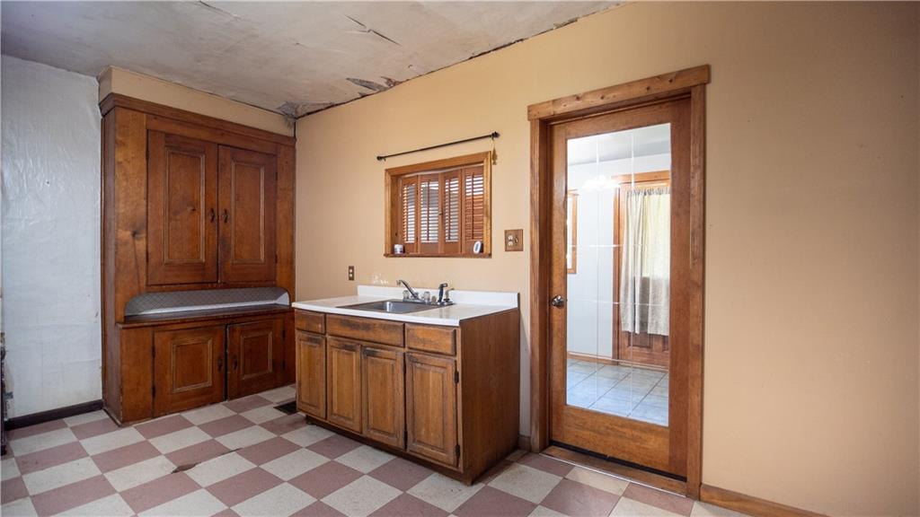 105 Snyder Lane Sarver, PA 16055 - Photo 16 of 48 a room that has a sink and a mirror