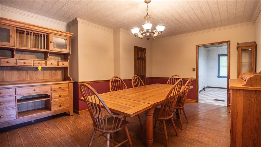 105 Snyder Lane Sarver, PA 16055 - Photo 21 of 48 a view of a dining room with furniture and wooden floor