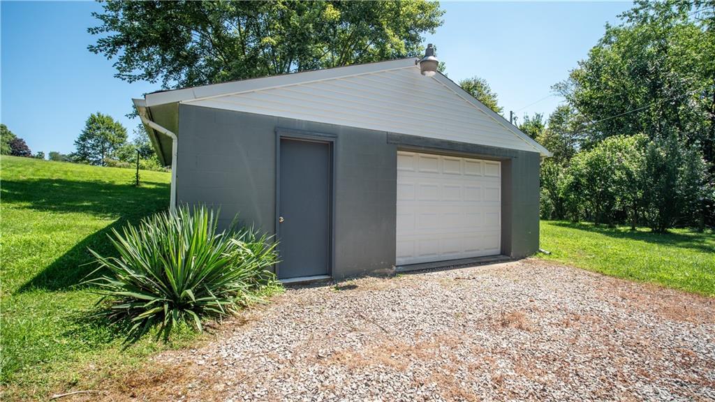 105 Snyder Lane Sarver, PA 16055 - Photo 42 of 48 a view of a backyard with a garden