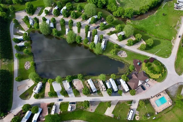a view of a golf course with a lake