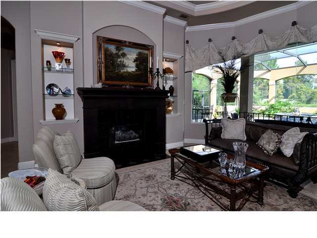 2950 Pine Valley Road Miramar Beach, FL 32550 - Photo 3 of 19 a living room with furniture and a fireplace