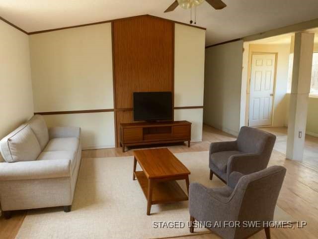 3702 Park Street Damon, TX 77430 - Photo 4 of 12 a living room with furniture and a flat screen tv
