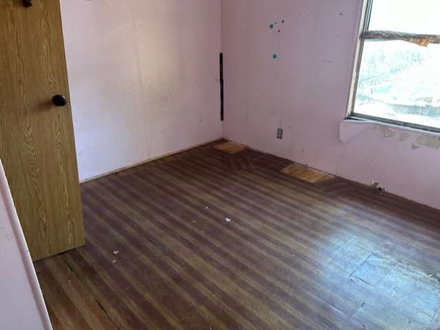 3702 Park Street Damon, TX 77430 - Photo 8 of 12 a view of a room with wooden floor and window