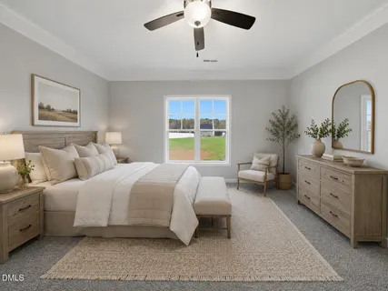 a spacious bedroom with a large bed and a chandelier