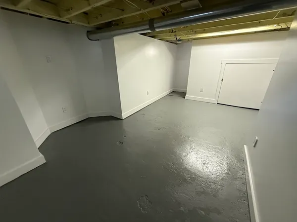 a view of a room with an empty space