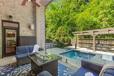 a kitchen with a stove a sink and a refrigerator