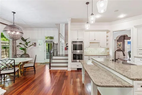 a living room with a couch and a fireplace