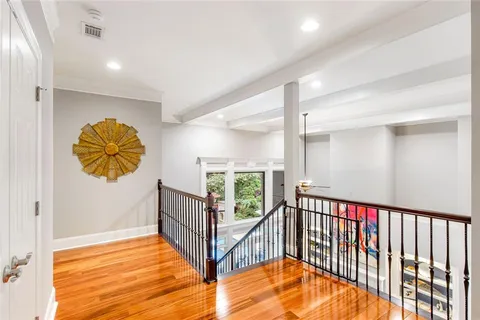 a kitchen with stainless steel appliances kitchen island granite countertop a refrigerator and stove