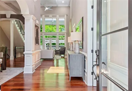 a view of kitchen with furniture and wooden floor