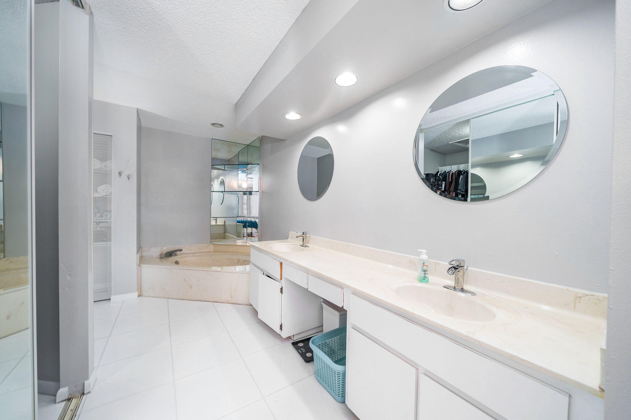 1877 Shower Tree Way Wellington, FL 33414 - Photo 11 of 47 a spacious bathroom with a double vanity sink mirror and bathtub