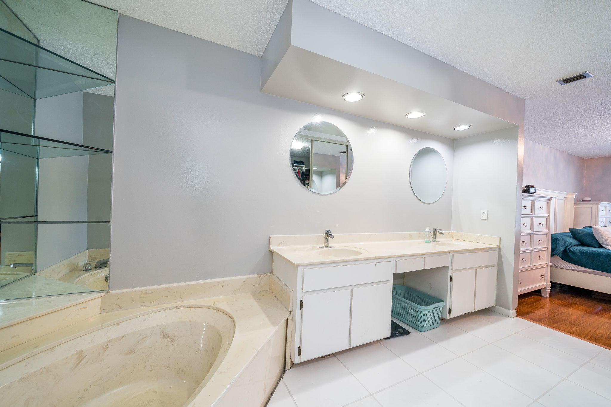1877 Shower Tree Way Wellington, FL 33414 - Photo 12 of 47 a spacious bathroom with a double vanity sink mirror and bathtub