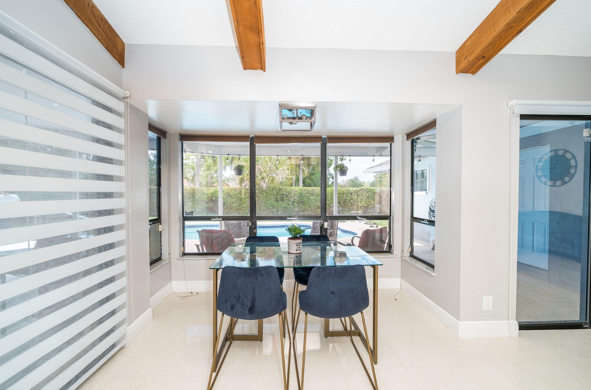 1877 Shower Tree Way Wellington, FL 33414 - Photo 22 of 47 a living room with furniture and a window
