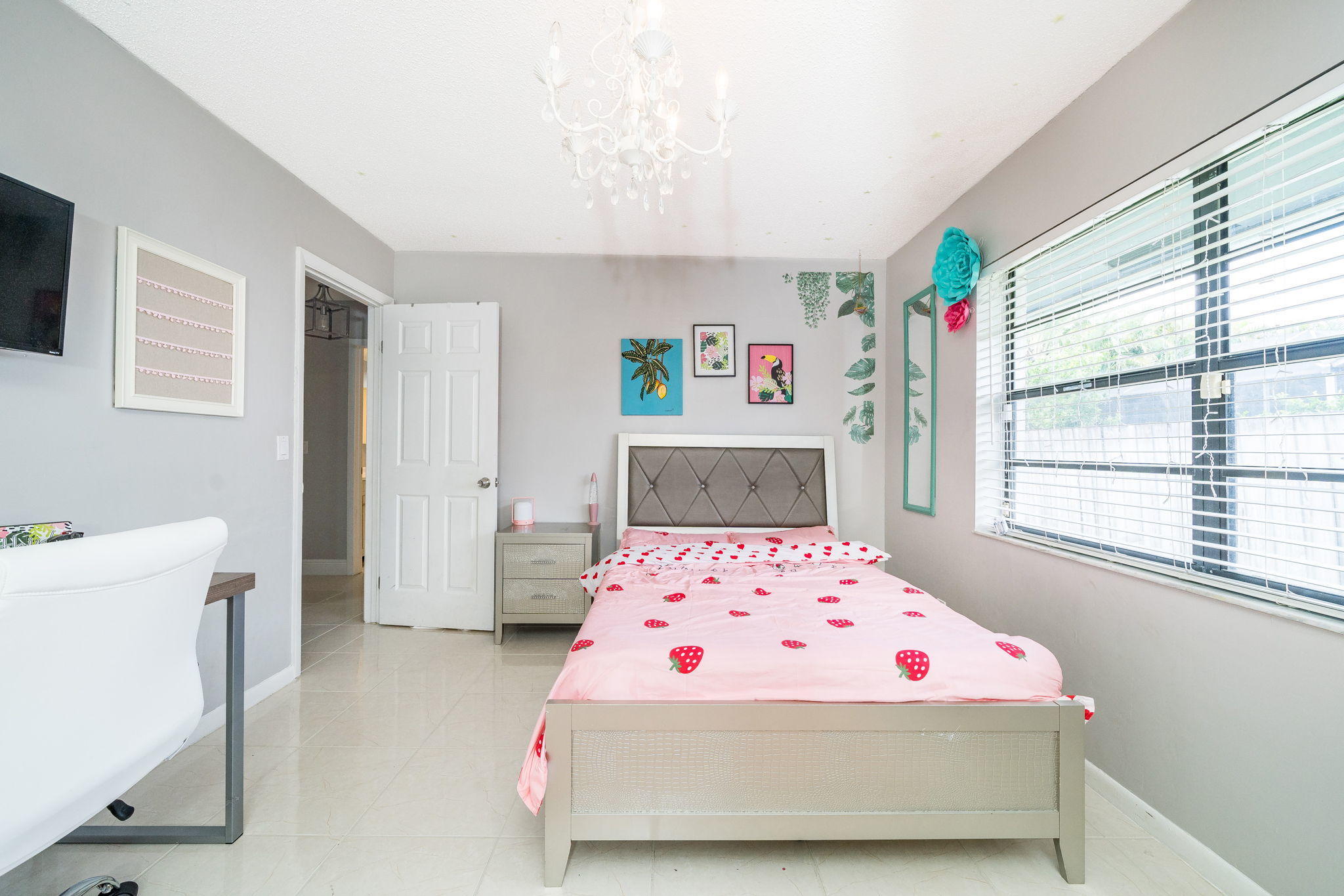 1877 Shower Tree Way Wellington, FL 33414 - Photo 29 of 47 a bedroom with a bed and a window in it