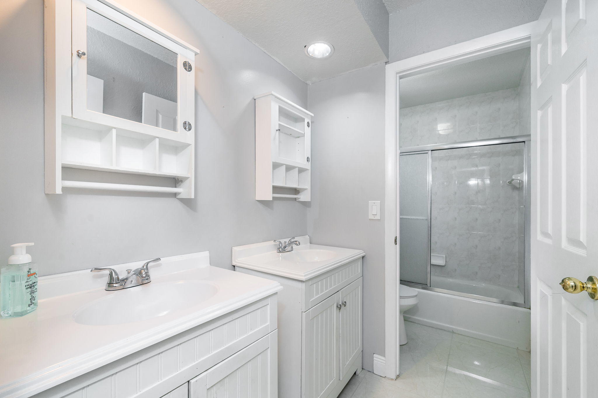 1877 Shower Tree Way Wellington, FL 33414 - Photo 32 of 47 a bathroom with a sink double vanity granite tub shower and a mirror