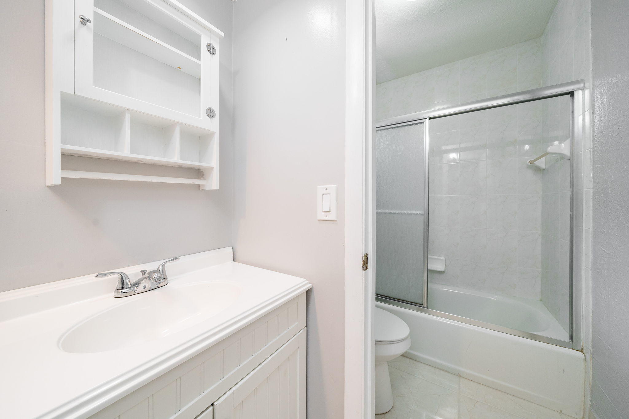 1877 Shower Tree Way Wellington, FL 33414 - Photo 33 of 47 a bathroom with a sink toilet and shower