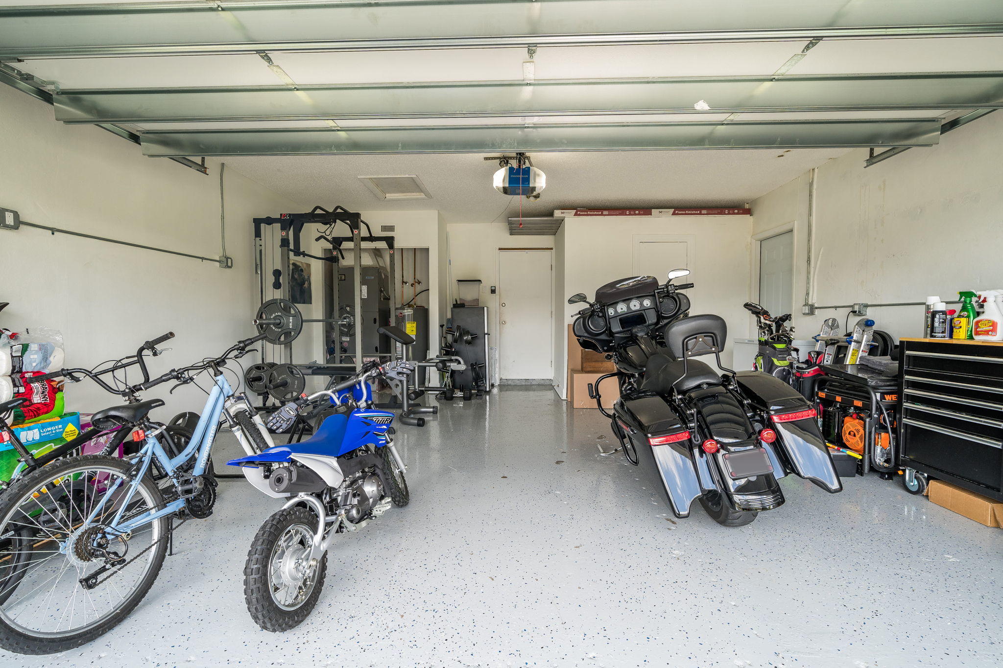 1877 Shower Tree Way Wellington, FL 33414 - Photo 47 of 47 a view of a storage with bicycles