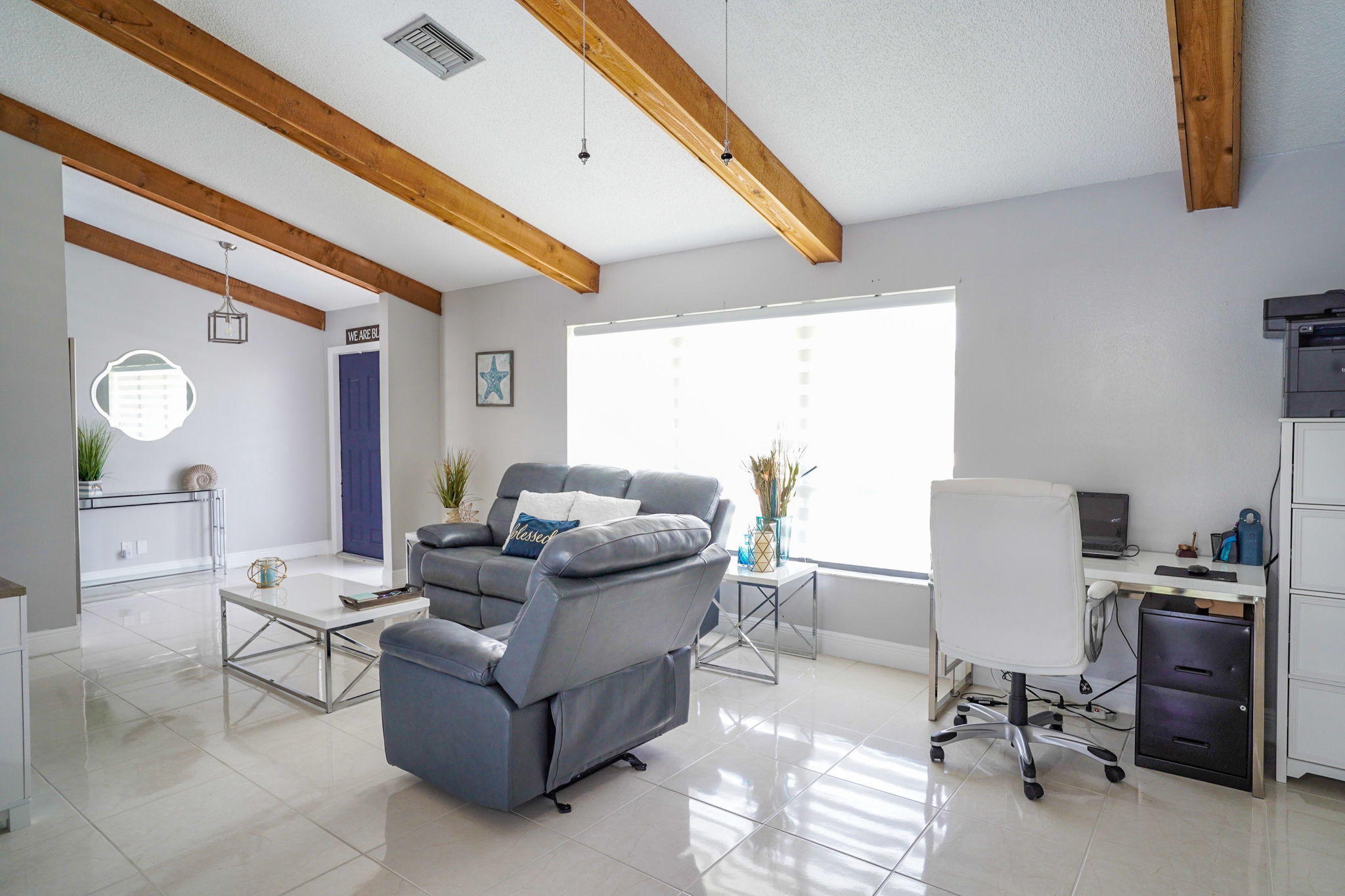 1877 Shower Tree Way Wellington, FL 33414 - Photo 7 of 47 a living room with furniture and a window