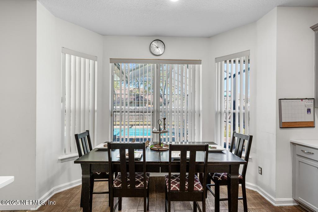 13694 Fish Eagle Drive West Jacksonville, FL 32226 - Photo 14 of 62 a view of a a dining room with furniture window and outside view