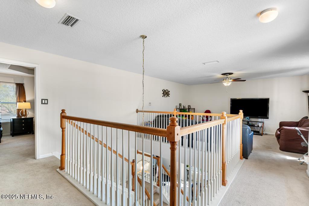 13694 Fish Eagle Drive West Jacksonville, FL 32226 - Photo 24 of 62 a view of a hallway with workspace and a window