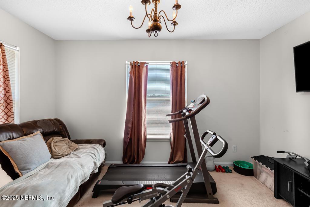 13694 Fish Eagle Drive West Jacksonville, FL 32226 - Photo 35 of 62 a view of a room with gym equipment