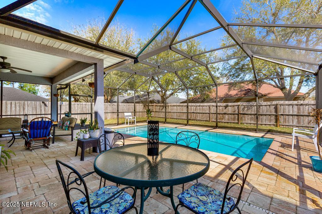 13694 Fish Eagle Drive West Jacksonville, FL 32226 - Photo 43 of 62 a view of a chairs and table in the patio