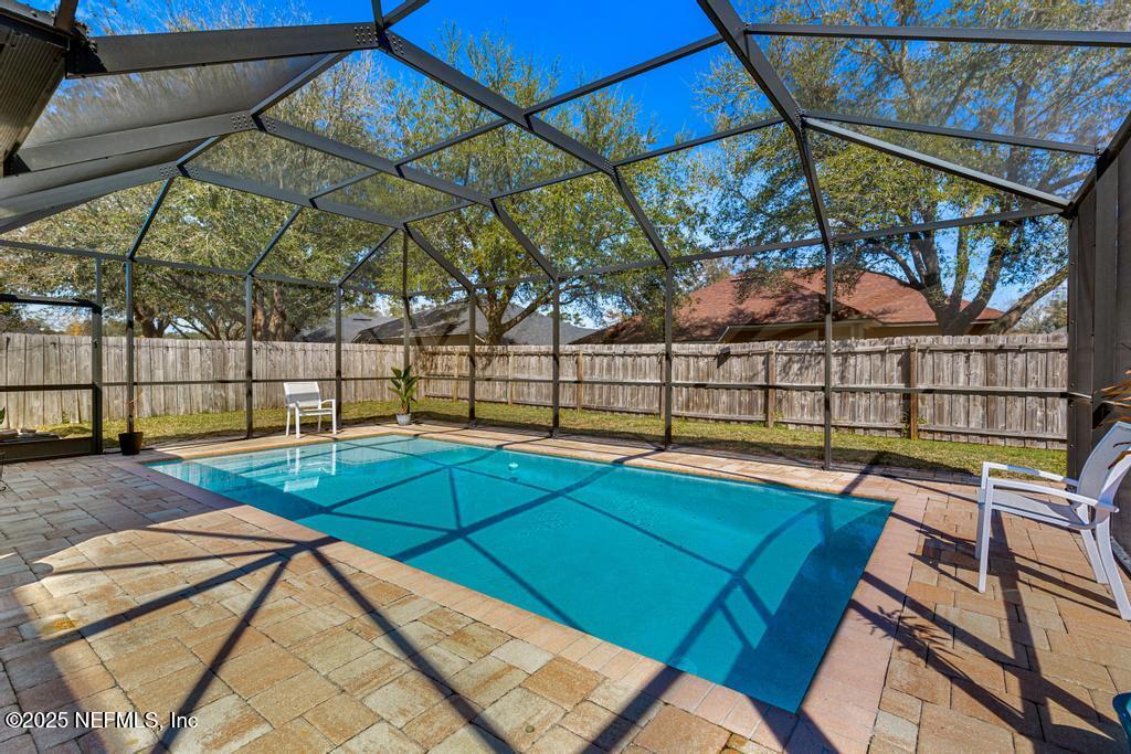 13694 Fish Eagle Drive West Jacksonville, FL 32226 - Photo 44 of 62 a view of outdoor space with swimming pool and sitting area