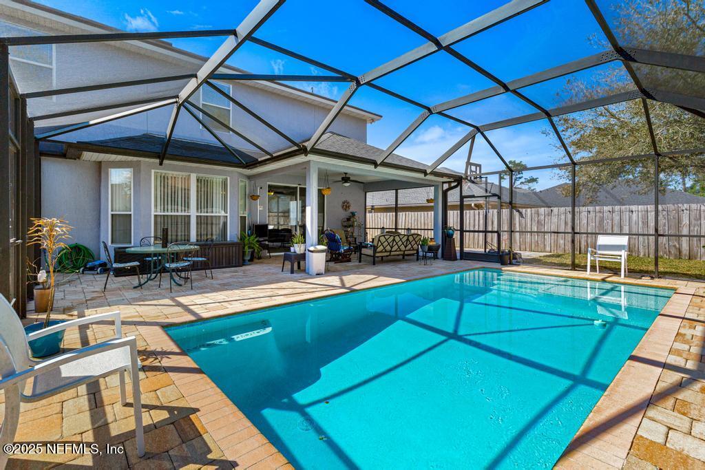 13694 Fish Eagle Drive West Jacksonville, FL 32226 - Photo 45 of 62 a view of a backyard with a swimming pool