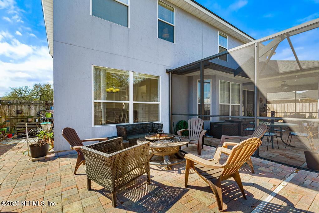13694 Fish Eagle Drive West Jacksonville, FL 32226 - Photo 47 of 62 a backyard of a house with outdoor seating