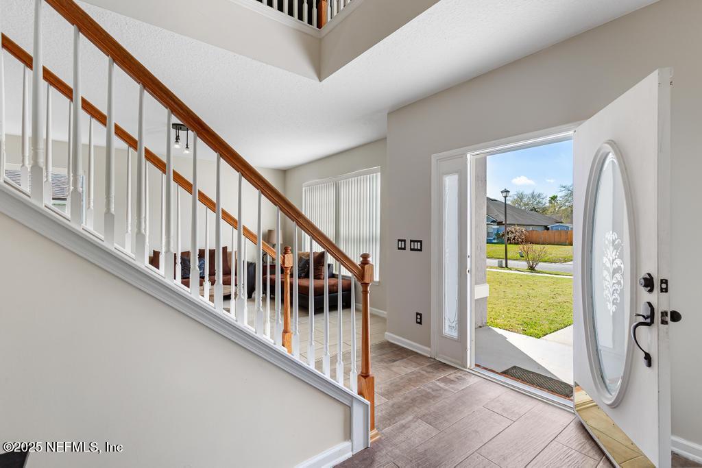 13694 Fish Eagle Drive West Jacksonville, FL 32226 - Photo 5 of 62 a view of an entryway door with a front door