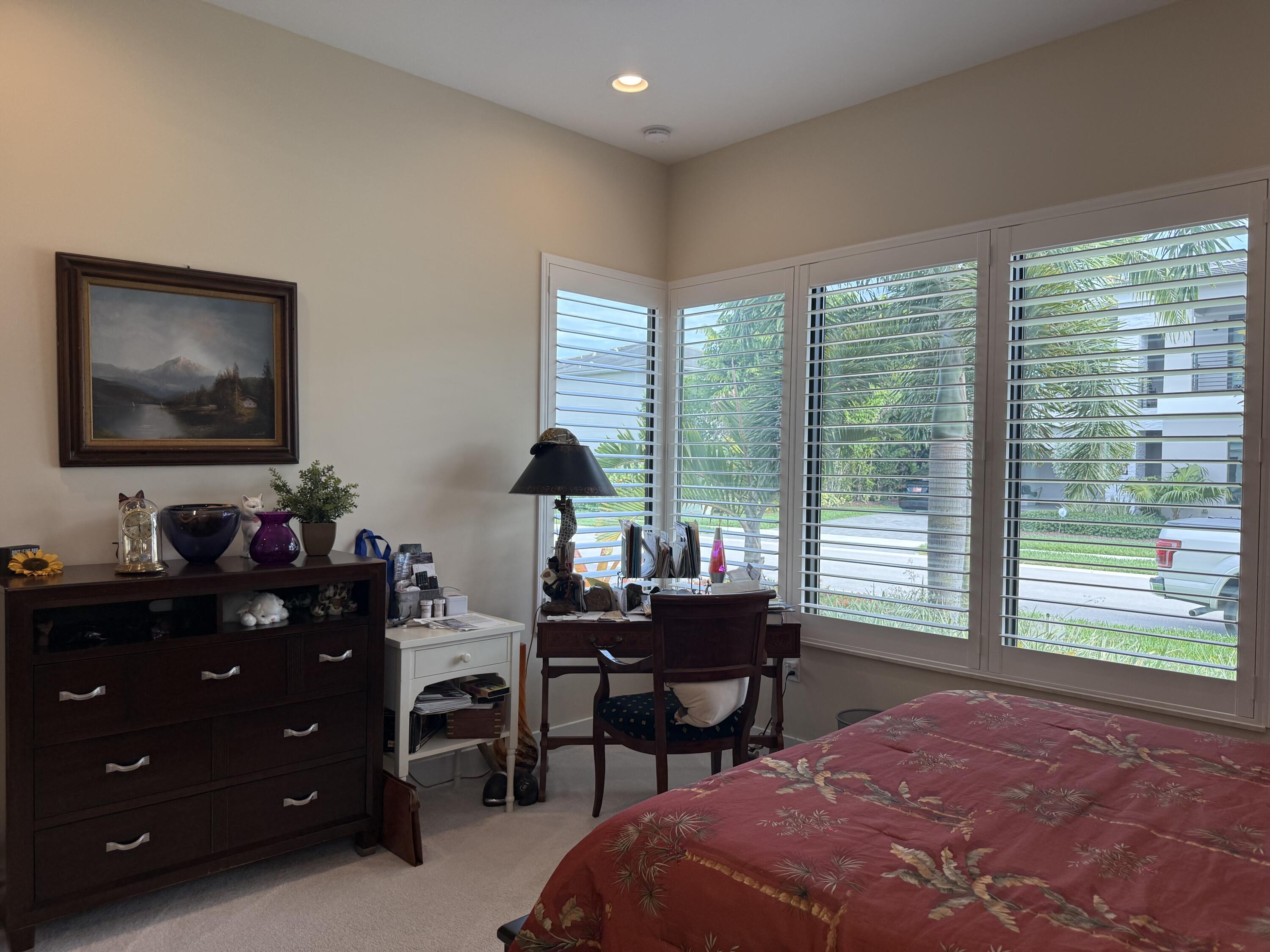 8575 Dearborn River Way Boca Raton, FL 33496 - Photo 19 of 32 a livingroom with workspace and a window