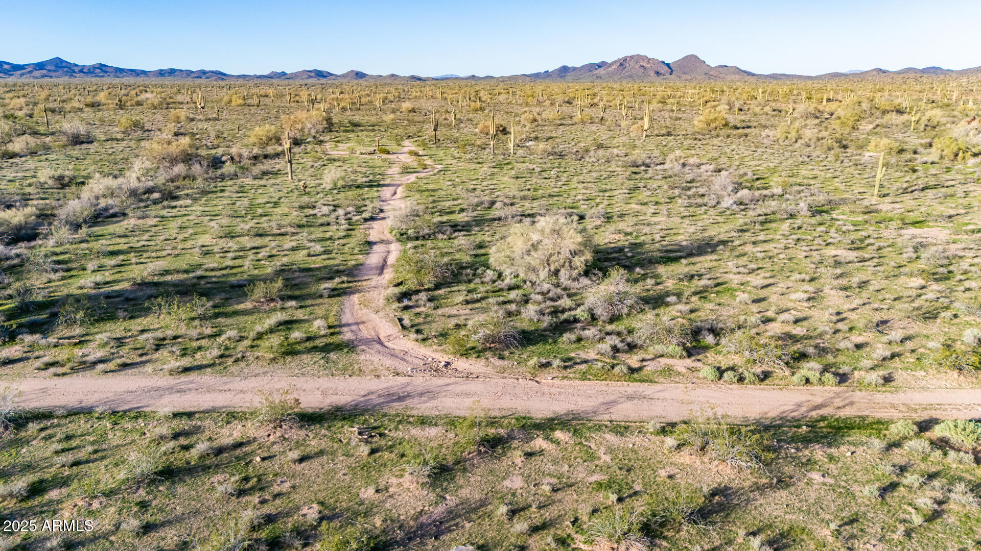31200 West Tamar Road, Unit 27 Wittmann, AZ 85361 - Photo 7 of 14 a view of lake and mountains