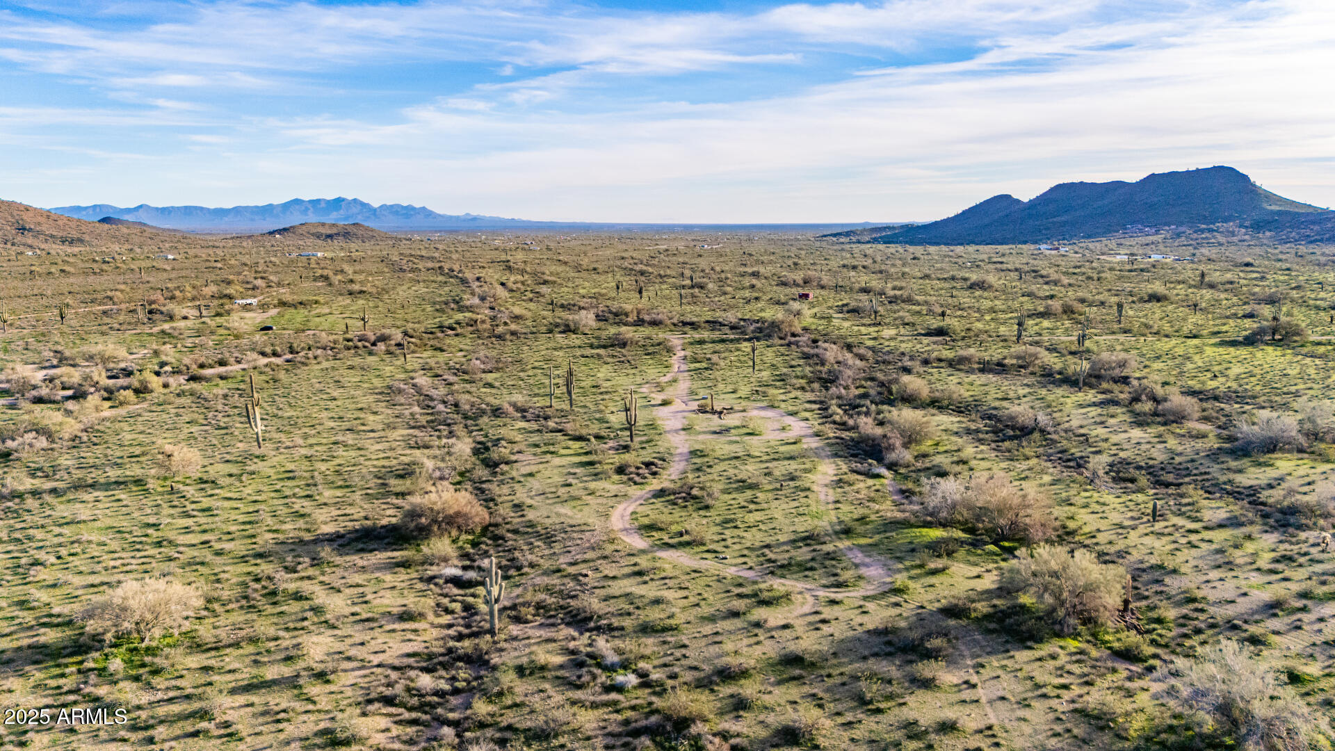 31200 West Tamar Road, Unit 27 Wittmann, AZ 85361 - Photo 10 of 14 a view of a city with sunset view
