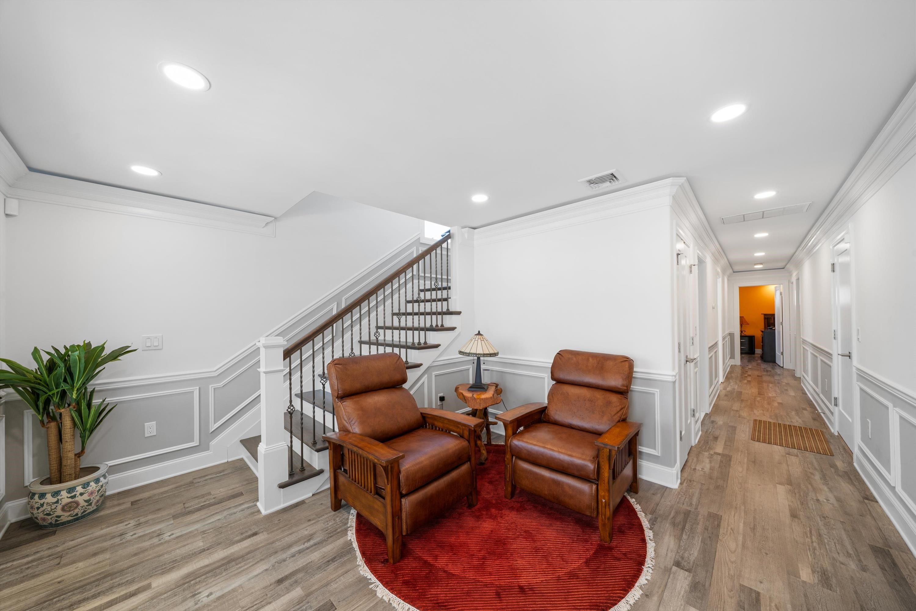 305 East Stockton Road Wildwood Crest, NJ 08260 - Photo 5 of 28 a hallway with furniture and wooden floor
