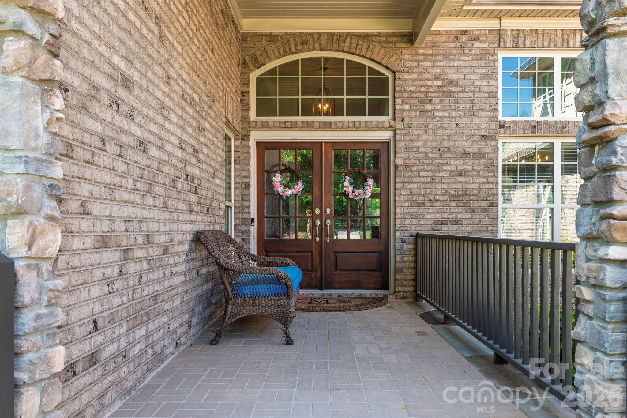 3138 Rappahannock Court, Unit 16 Matthews, NC 28104 - Photo 17 of 38 a view of building with outdoor seating space